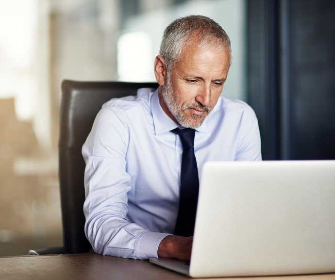 business man using laptop